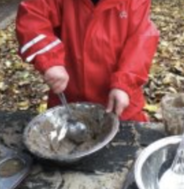 A child making mudcakes